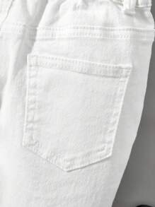 SHEIN Pantalones cortos de niño con diseño desgarrado de color liso