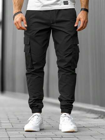 Manfinity LEGND Pantalon cargo noir unicolore décontracté pour hommes, pour la rentrée scolaire