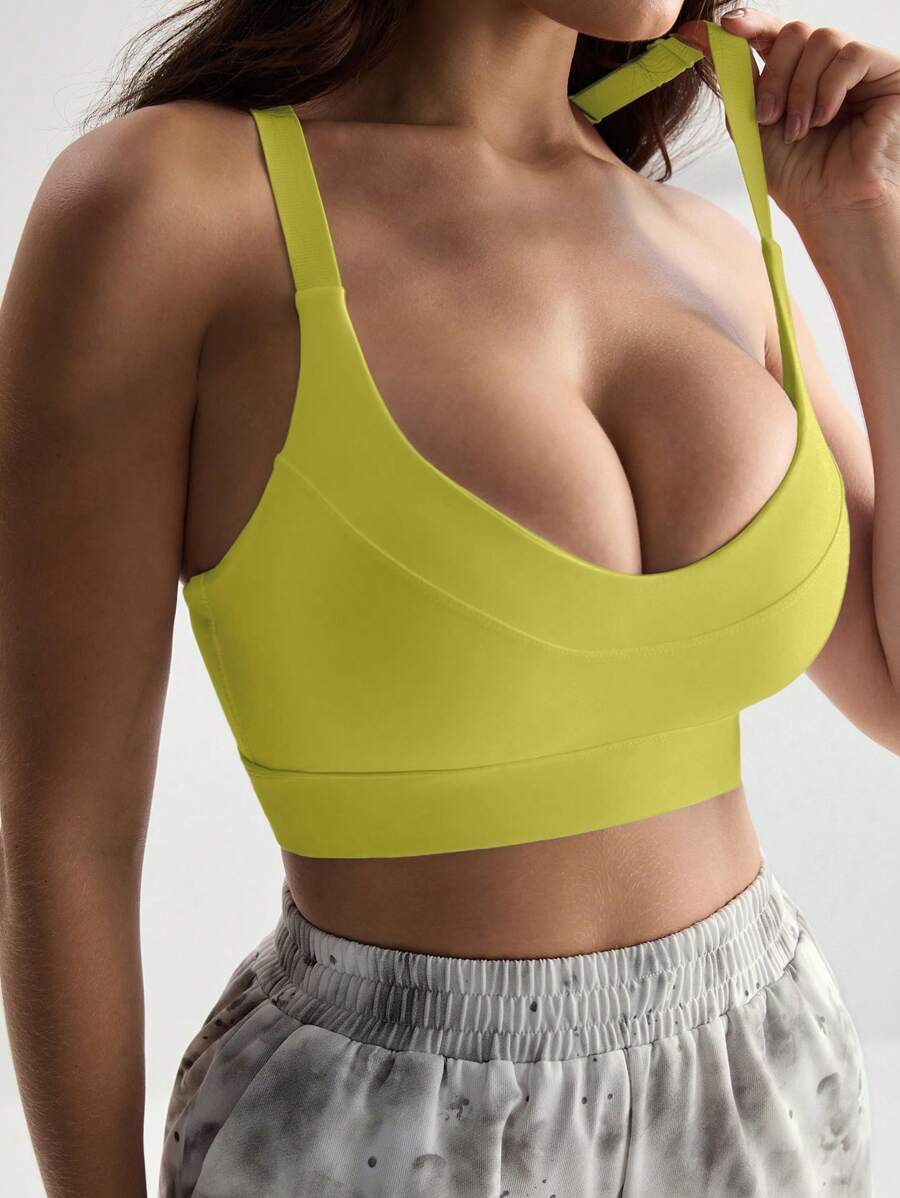 Menodora SHEIN Sport Women's Solid Color Round Neck Criss-Cross Back Supportive Sports Bra Dancewear - Yellow - View 1
