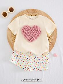 Cozy Pixies Set de 2 piezas con parte superior de manga corta de cuello redondo suave de punto con diseño de corazón y pantalones cortos de cintura elástica para niña bebé