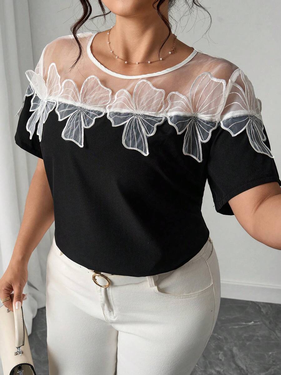 Elenzga Blouse en mousseline femme grande taille, casual et élégante, à manches courtes, coupe ample, panneaux transparents aux épaules, blocs de couleurs, volants, tissu en mousseline noire, printemps/été - Noir - Voir 1