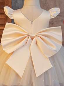 SHEIN Glamorique Kids Wedding Wedding Guest Pageboy Flower Girl Dance Dress, Baby Girl Princess Dress, Champagne Satin Small Fly Sleeves Make It Even Cuter And Playful. The Hem Is Full Of White Pearl Mesh Dress, And The Back Of The Lucky V-Shaped Detachable Satin Big Bow Is Suitable For Birthdays, Dances, Weddings, Festivals, Formal Occasions, Stage Piano Performances, Hosts, Parties Or Special Occasions. Daily Wear Baby Girl Bow Dress Baby Girl Dress Elegant Wedding Ivory Baby Dress Baby Girls Champagne Dress Satin Fall Winter