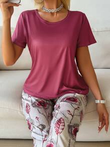 SHEIN Set de pijama de 2 piezas con top de manga corta de unicolor y pantalones con estampado floral para mujer