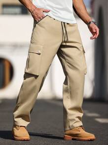 Manfinity Homme Pantalones de hombre de unicolor con cordón y bolsillos con cremallera