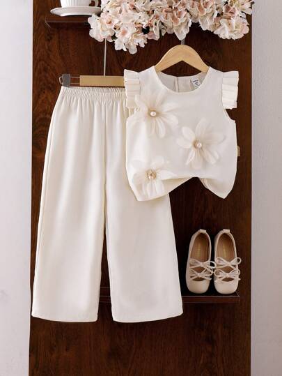SHEIN Elladie kids 2 件套小女孩简约优雅纯色圆领盖袖珍珠纽扣花卉设计背心上衣和长裤套装，适合多种场合