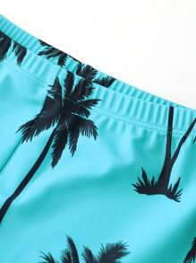 SHEIN Conjunto de traje de baño para niño preadolescente con top de manga larga tipo camiseta rashguard con estampado de palmeras y shorts de natación. Adecuado para usar en la piscina o en la playa.