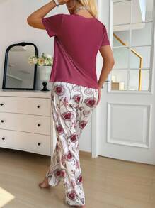 SHEIN Set de pijama de 2 piezas con top de manga corta de unicolor y pantalones con estampado floral para mujer