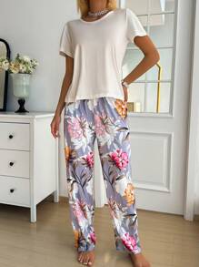 SHEIN Conjunto de pijama para dama con top de manga corta de unicolor y pantalón largo con estampado floral