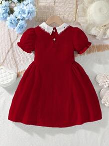 SHEIN Elladie kids Đầm ngắn tay phồng màu xanh nhạt tươi mát cho bé gái, phối cùng cổ áo ren trắng. Chiếc đầm mềm mại và thoải mái, hoàn hảo cho những ngày hè nóng bức. Màu xanh nhạt cổ điển giúp bạn trông tươi tắn và rạng rỡ, trong khi tay áo ngắn phồng tạo thêm nét tinh nghịch và dễ thương. Cổ áo ren trắng thanh lịch. Dù là để thư giãn ở nhà, tụ tập bạn bè hay tham dự một bữa tiệc mùa hè, đây đều là một lựa chọn lý tưởng. - Đỏ - Xem 2