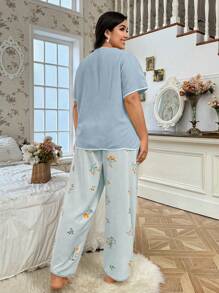 SHEIN Conjunto de pijama de mujer talla grande con estampado floral - Top sólido, pantalones estampados, vacaciones