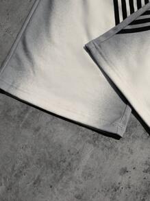 Manfinity Streetrush Pantalones deportivos holgados con cordón en la cintura, de rayas, versátiles para hombre