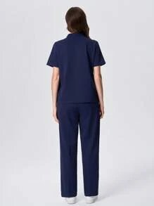 Scrubzie 2pcs Women Contrast Color Multi-Pocket Short Sleeve Top And Long Pants Uniform Set - Navy Blue - View 2