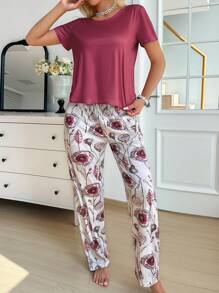 SHEIN Set de pijama de 2 piezas con top de manga corta de unicolor y pantalones con estampado floral para mujer