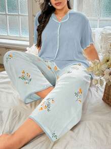 SHEIN Conjunto de pijama de mujer talla grande con estampado floral - Top sólido, pantalones estampados, vacaciones