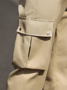 Manfinity Homme Pantalones de hombre de unicolor con cordón y bolsillos con cremallera