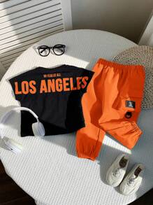 SHEIN 2 件套男婴字母图案针织柔软圆领落肩短袖上衣和休闲裤套装，适合春夏季室内外穿着 - 彩色 - 查看 6