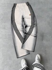 Manfinity Streetrush Pantalones deportivos holgados con cordón en la cintura, de rayas, versátiles para hombre