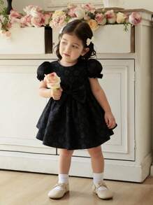 圆领短袖提花蝴蝶结收腰女童连衣裙。新款礼服上市，舒适时尚优雅甜美可爱清新。 - 黑色 - 查看 1