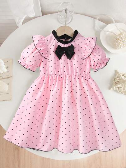 Vestido casual lindo de manga corta abullonada con decoración de lazo y estampado de lunares para niña