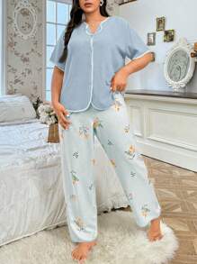 SHEIN Conjunto de pijama de mujer talla grande con estampado floral - Top sólido, pantalones estampados, vacaciones