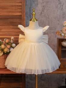 SHEIN Glamorique Kids Wedding Wedding Guest Pageboy Flower Girl Dance Dress, Baby Girl Princess Dress, Champagne Satin Small Fly Sleeves Make It Even Cuter And Playful. The Hem Is Full Of White Pearl Mesh Dress, And The Back Of The Lucky V-Shaped Detachable Satin Big Bow Is Suitable For Birthdays, Dances, Weddings, Festivals, Formal Occasions, Stage Piano Performances, Hosts, Parties Or Special Occasions. Daily Wear Baby Girl Bow Dress Baby Girl Dress Elegant Wedding Ivory Baby Dress Baby Girls Champagne Dress Satin Fall Winter