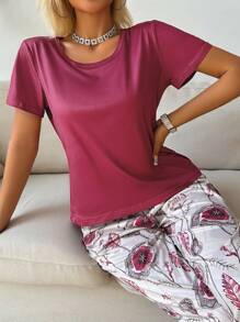 SHEIN Set de pijama de 2 piezas con top de manga corta de unicolor y pantalones con estampado floral para mujer
