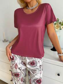 SHEIN Set de pijama de 2 piezas con top de manga corta de unicolor y pantalones con estampado floral para mujer