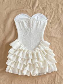 Soleia Mono sexy con espalda descubierta, volantes entrelazados y textura por capas