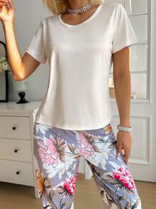 SHEIN Conjunto de pijama para dama con top de manga corta de unicolor y pantalón largo con estampado floral
