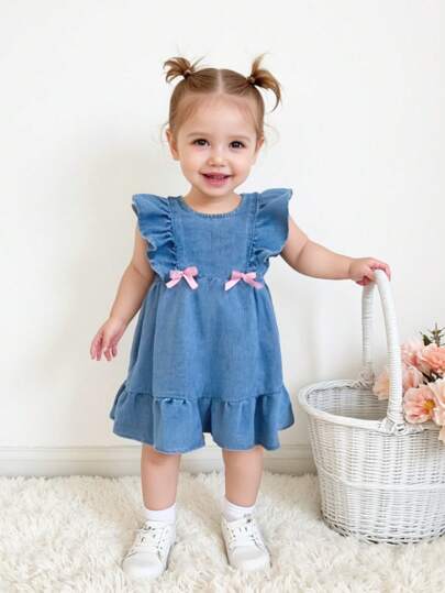 SHEIN Baby Girls' 2025 New Pink Ribbon Bow Accent Blue Denim Cap Sleeve Dress,Kid Girls Spring And Summer Casual Vacation Country Boho Wear, Beach Outfits For Kid Girls,Western Street Wear For Girl,Spring Break Outfits,Rave Outfits Festival Denim Dress,Vacation Ruffle Dress Outfits
