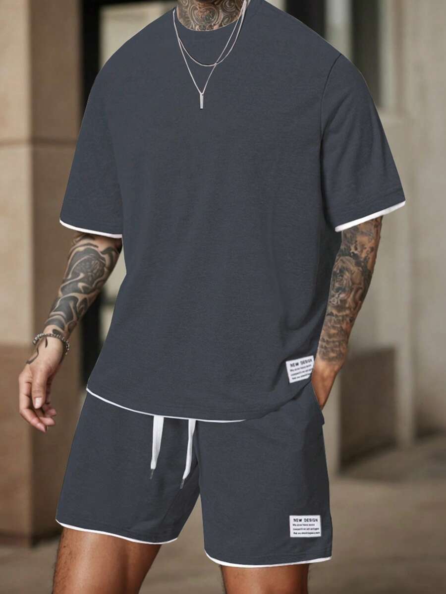 Manfinity Homme Bộ áo phông và quần short họa tiết tương phản thường ngày mùa hè dành cho nam - Graphite - Xem 1
