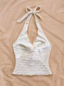 Soleia Top ajustado sin espalda con cuello de halter, nudo delantero y textura de punto en color beige, apto para fiesta, cita, té de la tarde, playa, atuendo de verano