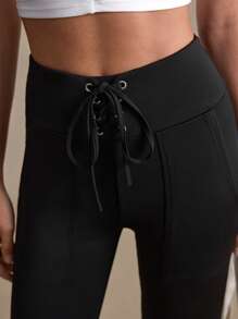 Women's Extra Long Knitted Flare Sports Pants With Pockets And Lace-Up Detail - Black and White - View 7