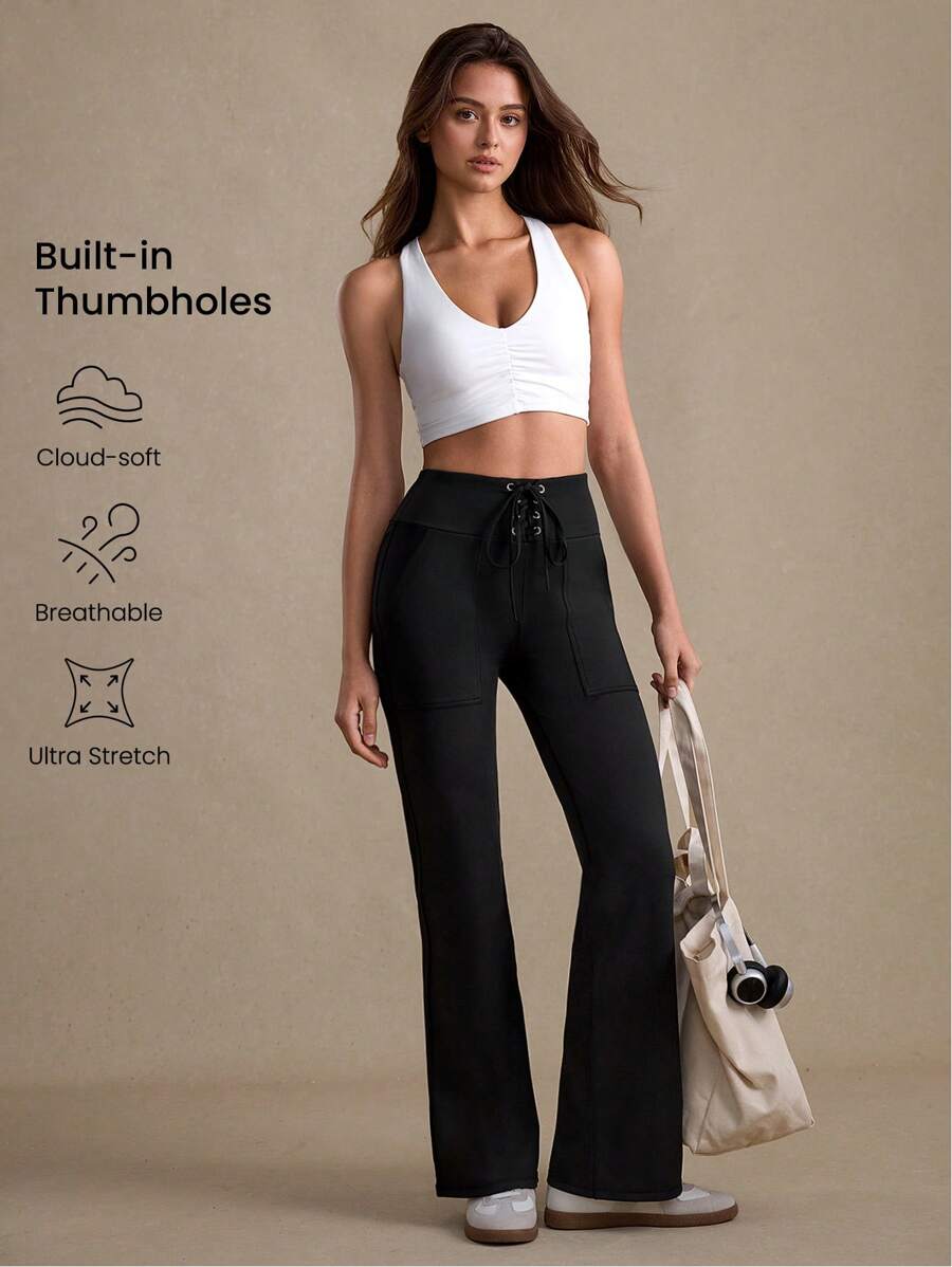 Women's Extra Long Knitted Flare Sports Pants With Pockets And Lace-Up Detail - Black and White - View 1