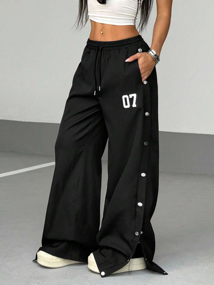 StreetHx Streetwear 女式休闲侧金属扣开衩纯色印花抽绳长裤，春夏 - 黑色 - 查看 1