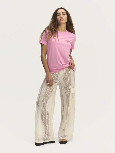 Nöista Pink Minimal T-Shirt Featuring A Clean Design With Subtle Lettering, Perfect For Relaxed Everyday Wear, Layering, Or Pairing With Denim For A Timeless Look.