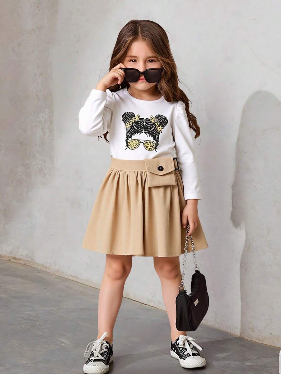 SHEIN للبنات الصغار جرافيك شخص اكمام شكل ساق الضأن تي شيرت و حزام تنورة - متعدد الألوان - مشاهدة 1