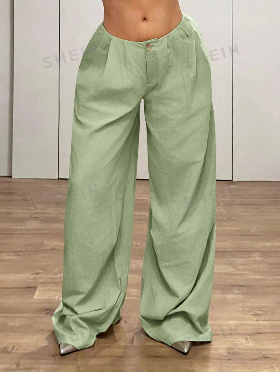 SHEIN ICON Pantalones extra largos de tiro súper bajo, sueltos y acampanados en estilo retro