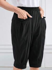 Miaspire Pantalones de verano/primavera casuales de largo medio para mujeres, con bolsillos con decoración de botones en tela negra, acortados