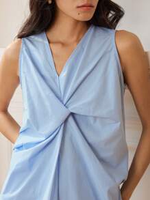 Dazy-Less Chemise sans manches pour femmes à col en V avec design torsadé, pour le travail et les occasions décontractées en été