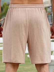 Manfinity Homme Pantaloncini casual con texture e coulisse in vita per uomo taglia comoda, pantaloni in lino da uomo per l'estate, pantaloni da spiaggia per uomini, pantaloni estivi da uomo - Cammello - Visualizzare 2