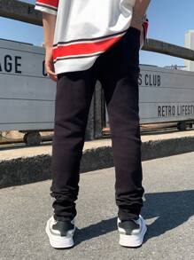 SHEIN 青少年男童时尚休闲 Y2k 白色涂鸦黑色牛仔修身不对称剪裁弹力紧身牛仔裤，适合儿童穿着，柔软舒适，适合日常穿着，也适合儿童春夏穿着。