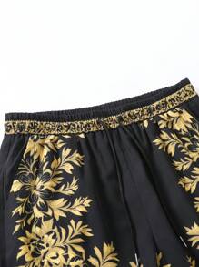 Manfinity Homme Conjunto de camisa de manga corta con estampado todo sobre y pantalones cortos con cordón en la cintura para hombres de talla grande