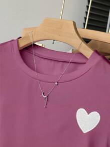 INAWLY Maglietta semplice e versatile da donna con ricamo a forma di cuore sulle maniche corte, adatta per l'estate