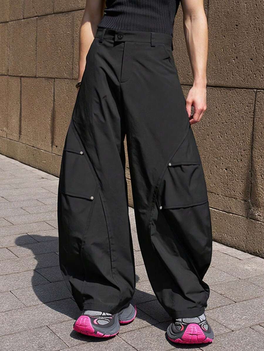 Manfinity EMRG 男士黑色工装裤，曲线刀片形剪裁休闲裤，金属铆钉宽松长裤，街头风格裤子 - 黑色 - 查看 1