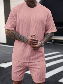 Manfinity Homme 男士度假休闲风格，采用 INS 风春夏橙色毛圈布花卉短袖衬衫和短裤套装，饰以向日葵和雏菊图案，是音乐节、夏威夷海滩度假和日常穿着的完美之选。也是送给男朋友或老公的绝佳礼物。男士短裤套装，男士两件套，男士 T 恤套装，男士提花针织 T 恤，简约时尚，适合夏季男士两件套休闲两件套男士两件套夏季 - 粉色 - 查看 3