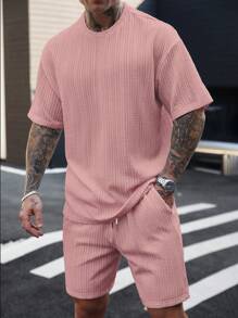Manfinity Homme 男士度假休闲风格，采用 INS 风春夏橙色毛圈布花卉短袖衬衫和短裤套装，饰以向日葵和雏菊图案，是音乐节、夏威夷海滩度假和日常穿着的完美之选。也是送给男朋友或老公的绝佳礼物。男士短裤套装，男士两件套，男士 T 恤套装，男士提花针织 T 恤，简约时尚，适合夏季男士两件套休闲两件套男士两件套夏季 - 粉色 - 查看 6