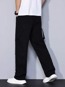 Manfinity Homme Men's Black Denim Carpenter Jeans: Stylish Ripped And Repaired Long Jeans With Blue Accents And Zipper Detail - Black - View 2