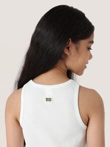 SUMWON Top sin mangas con patrón de moño, de canalé, casual de verano, de atletismo, danza, gimnasio y yoga con bordado delicado para niñas. Camiseta de entrenamiento atlético juvenil para entrenamientos.