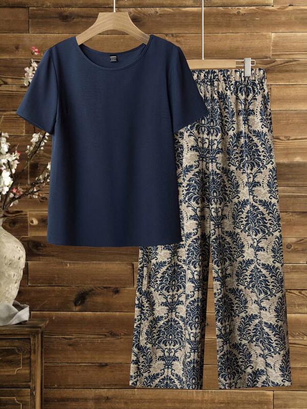 Lacomfia 2pcs/Set Women Vacation Solid Color Round Neck Short Sleeve Top And Botanical Print Pants